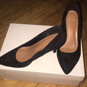 Black suede pumps